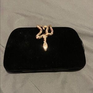 Elegant Black Clutch with Gold Accent